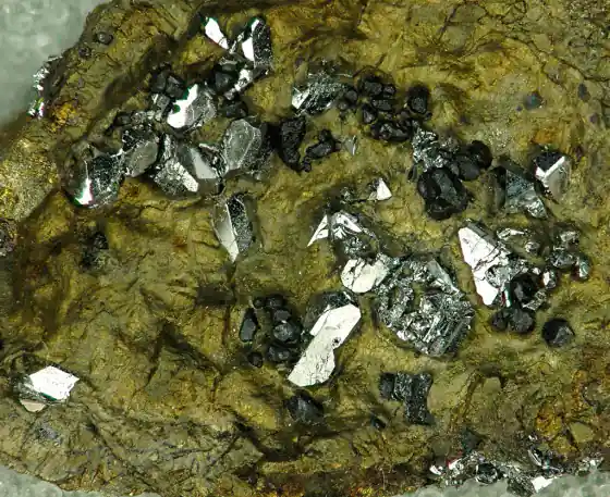 Mineral ore with metallic crystals